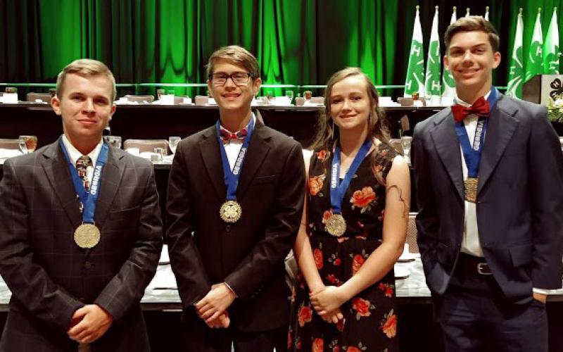 Photo submitted — The local 4-H Forestry Team, from left to right, was James Turpin, Ben Tellano, Hailey Jones and Adam Walters.