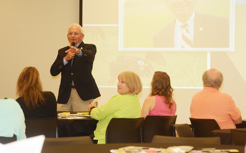 Sunshot by Michael Hall — State Commissioner of Agriculture Gary Black speaks to a crowd of regional officials Tuesday at the Hart County AgriScience Center in Hartwell.