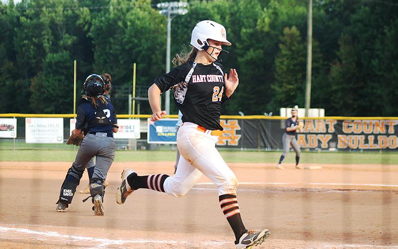 Sunshot by Grayson Williams — Anslee Mitchell scores a run against East Jackson last week at Hart County High School. 