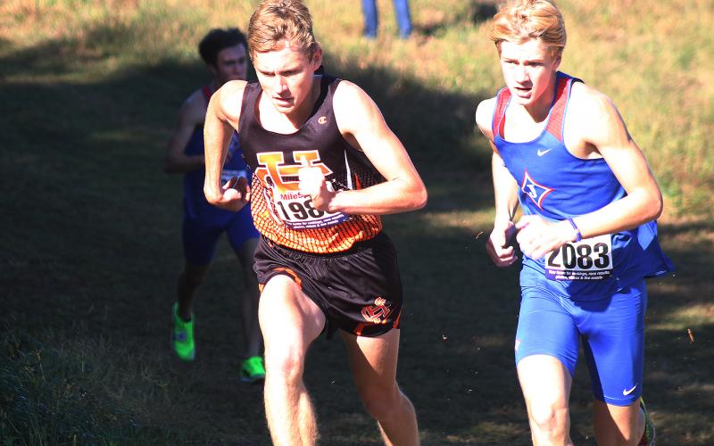 Sunshot by Grayson Williams — Hart County runner Sam Garringer pulls away from the competition on Oct. 24 in Franklin County on his way to first-place finish at the Region 8-AAA meet.