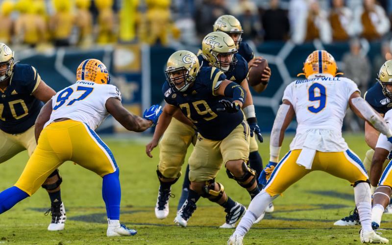 Photos by Danny Karnik/Georgia Tech - Georgia Tech center William Lay, center, a Hart County graduate, blocks on the offensive line during a game this season against Pittsburgh.