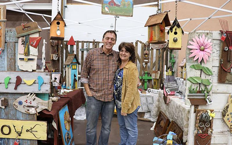 Jim and Sonja Corder of Birdhouse and More show off some of their wares at the 2018 Holiday Bazaar at Cornerstone Baptist Church in Hartwell. 