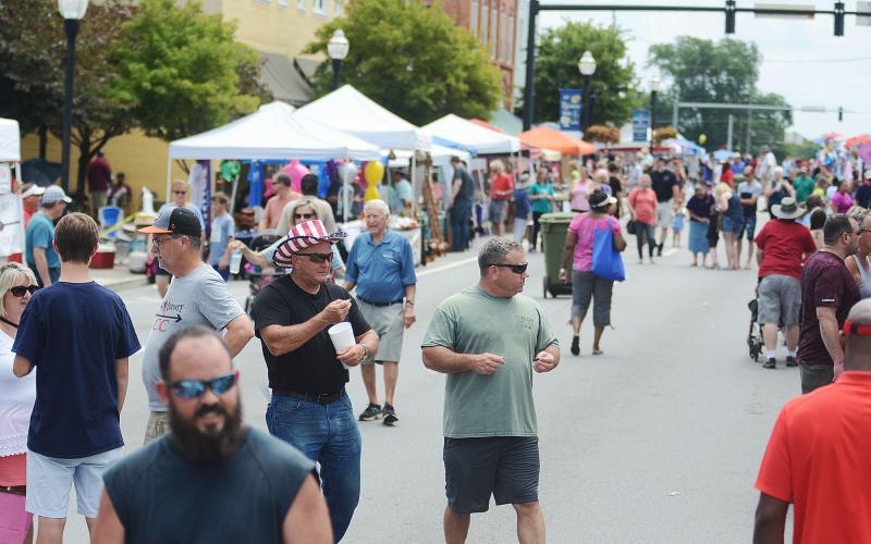 Sunshot from file - The crowd at the Pre-Fourth celebration in downtown Hartwell enjoys the festival last June. The Hartwell Main Street Program has been named the Main Street Program of the Month for January 2020.