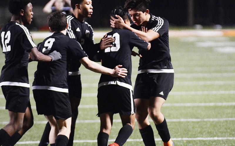 Sunshot from file — 4. Hart County’s soccer team celebrates after a goal in March against Elbert County. The team earned a playoff berth for the first time in 16 years in 2019.