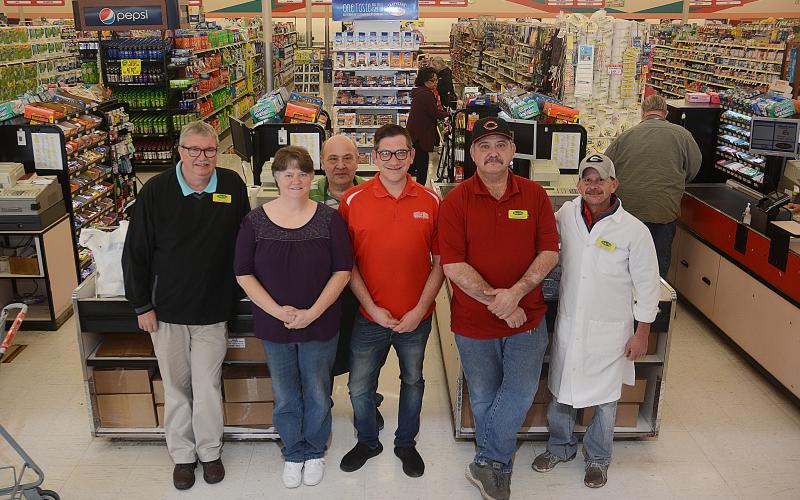 Sunshot by Michael Hall - From left to right are Quality Foods store manager Tony Lark, Joan Kimbrell, Curtis Seymour, Eric Bailey, Shannon Vickery and Tex Maxwell.