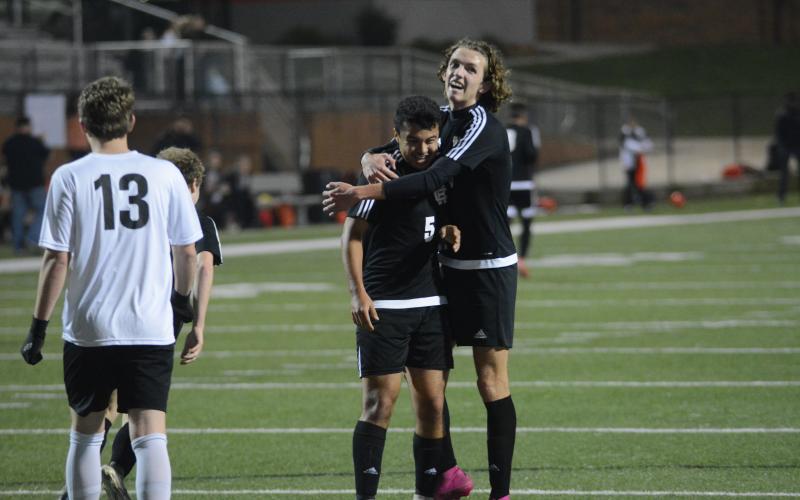 Sunshot by Grayson Williams Renso Escobedo, left, celebrates with Lincoln Zemaitis following Escobedo’s goal against Oglethorpe County at Hart County High School on Feb. 25. 