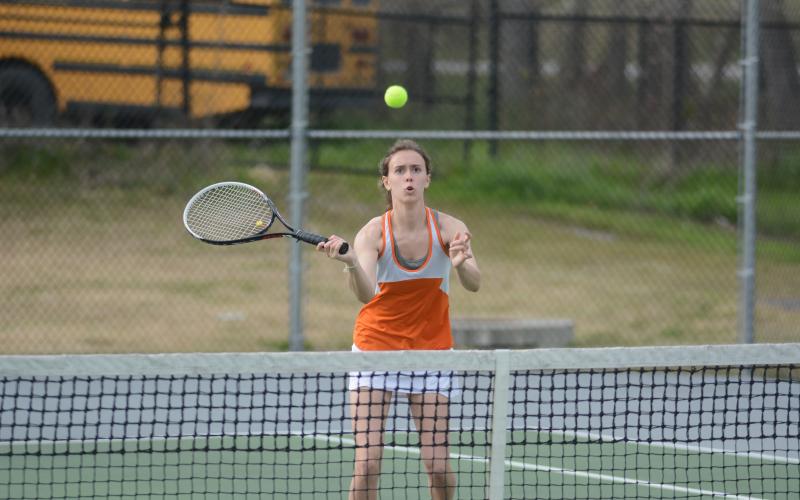 Sunshot by Grayson Williams - Sydney Smith returns a volley at Hart County High School on March 12. 