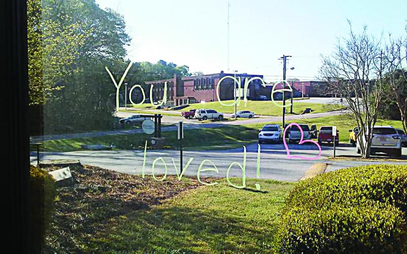 A message of love as written on a window by teacher Kristen Zemaitis at Hartwell Health and Rehab.