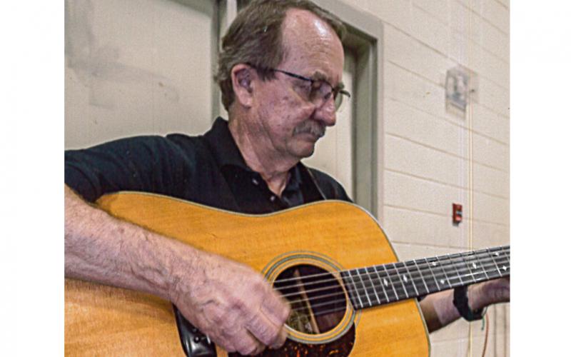 Sunshot by Bill Powell — Richard Frady plays the guitar in 2018, prior to his battle with COVID-19 that has had him hospitalized in Anderson since March 28. 