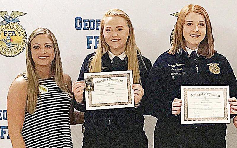Photo submitted — Bekah Stewart, right, poses for a photo with Breanna Bellinger and FFA advisor and agriculture teacher Anna Smith at a past FFA event. Stewart said choosing a favorite teacher was tough, but Smith had the biggest impact on Stewart’s college and career plans.