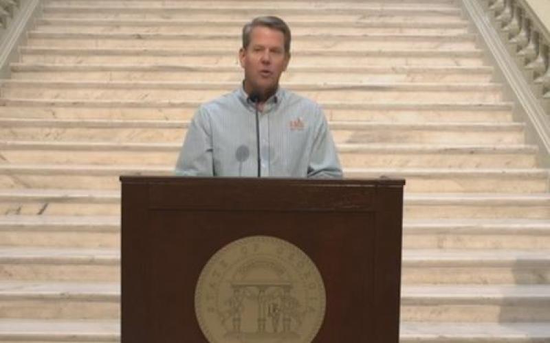 Gov. Brian Kemp speaking at the Capitol Building in Atlanta on Thursday. 