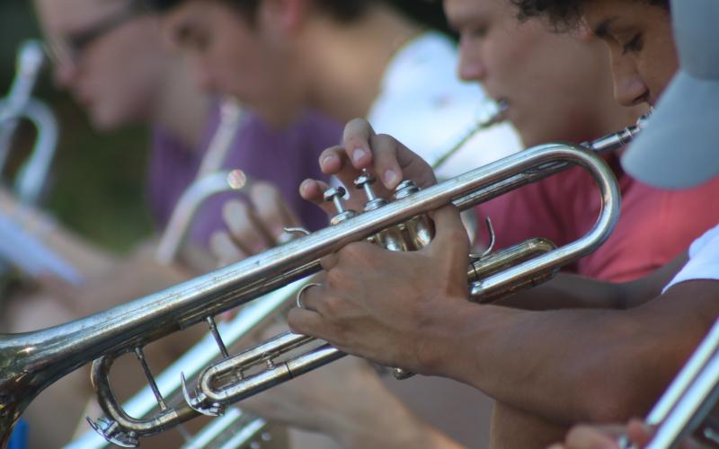 The trumpets section practices their music at band camp on Tuesday at Hart County High Schol.