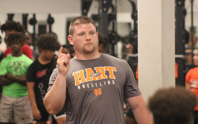 Sunshot by Grayson Williams — Matt Patton, new Hart County Middle School football coach, speaks to players during the first day of workouts on Monday at the high school. 