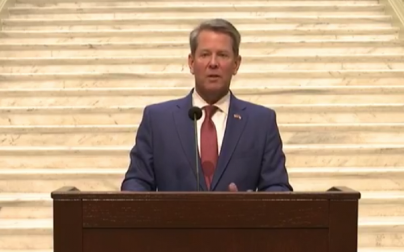A screenshot of Brian Kemp speaking Friday morning at the Capitol in Atlanta