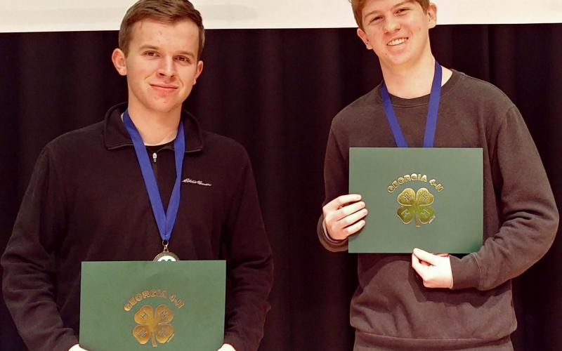 Photos submitted James Turpin, left, and Sean Leard, above, show off their certificates for participating in a recent virtual state competition.