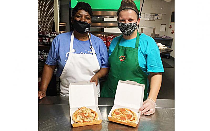 Photo submitted - Hart County Middle School cafeteria staff show off the new Smart Mouth Pizzas the school is serving this year.