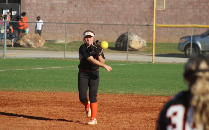 Gabby Buffington throws to first in the Lady Diamond Dogs’ win over East Jackson. 
