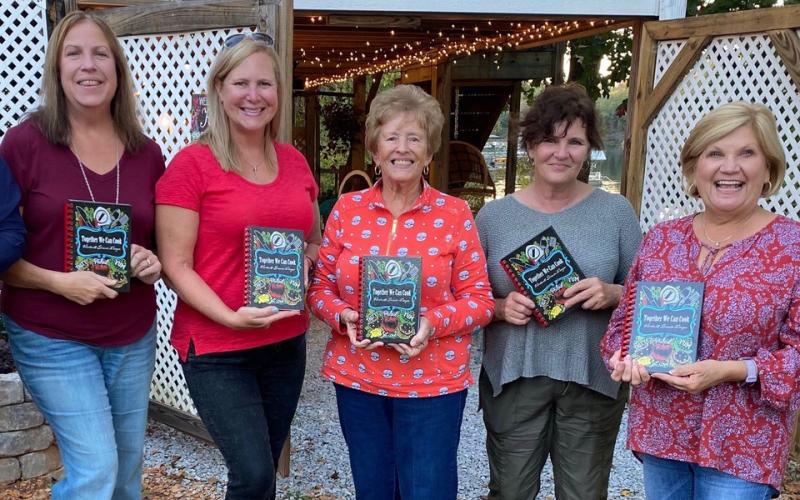 Photo submitted - Hartwell Service League members from left to right, Dixie Northrup, Suzee Northrup, Kay Cleveland, Debra Kennedy and Beth Mewborn, show off the service league’s cookbook, now on sale. 
