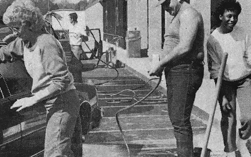Walmart employees wash cars, as pictured in the Nov. 5, 1987 edition of The Sun.