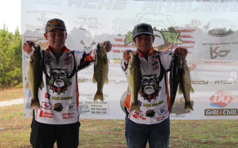 Joshua Haley and Jacob Fowler show off their catches in the middle school portion of the intra-squad tournament the Hart County middle and high school anglers competed in last weekend.  Photo submitted