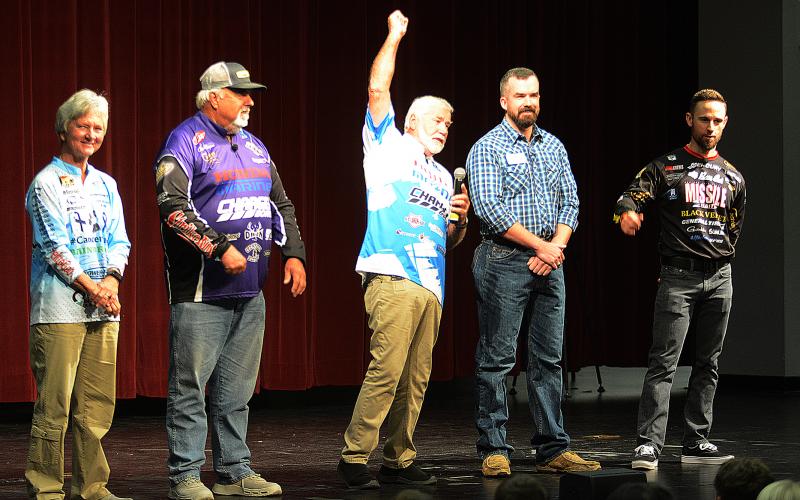 Ray Brazier, center, from “Fishing University” gets the crowd of Hart County High School students riled up during the show’s visit in October 2019.