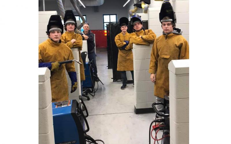  Photo submitted — Hart County High School welders who earned their technical college certification in welding through a class taught by Mike Carey at Hart College and Career Academy pose for a photo recently.