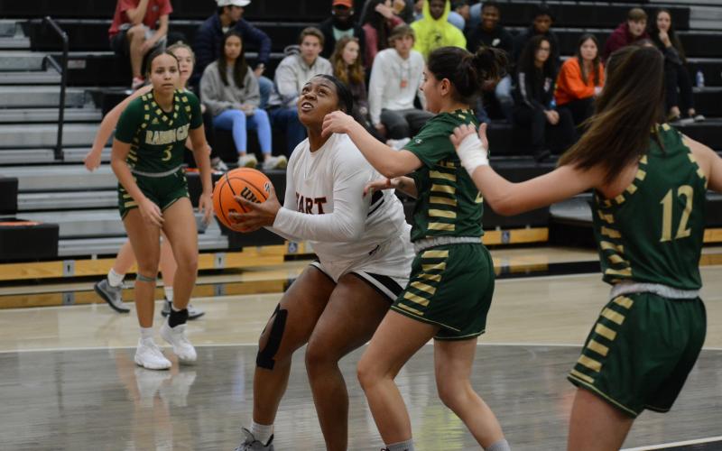 Sunshot by Grayson Williams - Taniya “Nesha” Alexander puts up a shot under the basket against Rabun Gap-Nacoochee on Tuesday, Jan. 5, at Hart County High School. 