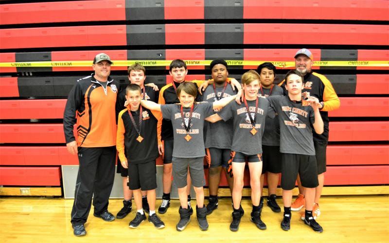 Sunshot by LaDonna Harris - The middle school wrestling team poses for a photo with their Peach State Championship Tournament medals on Saturday, Jan. 16, at Jackson County High School. They are, back row, from left to right, Jeff Krause, Josh Lewis, Hayden Hoglen, Bryce Durrett, Ignacio Trullijio, Steve Horton. In the front row are Jackson Carter, Bobby Jones, Harrison Krause, Cameron Risner.
