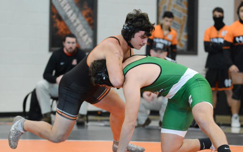 Eli Tyler takes down a Murray County opponent on Saturday at Hart County High School