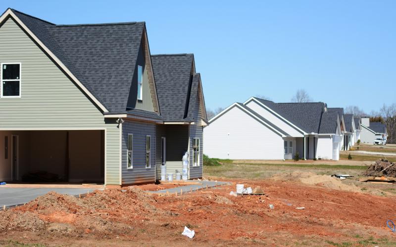 Sunshot by Michael Hall - New homes are pictured along Reed Creek Highway in Hart County.