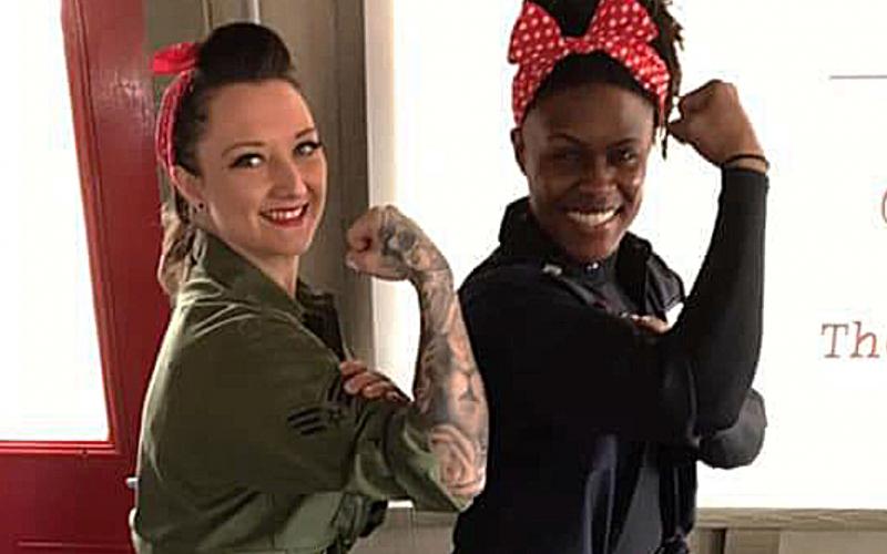 Shawna “Sky” Watkins and Ki Re show off their best Rosie poses. 