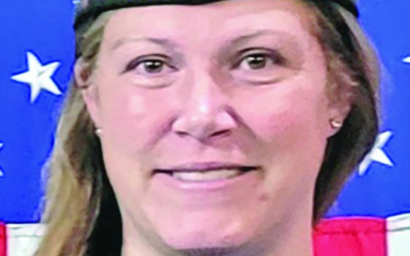 Gabrielle Beutler, pictured in a photo she submitted to the Franklin County Citizen after being named commander of Lavonia VFW Post 5897 in June, was arrested last week on charges of falsely representing herself as a veteran. 