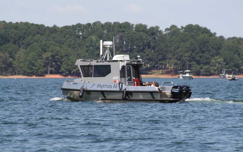 A National Transportation Safety Board vessel used in the recovery of a sunken plane floats near Long Point Recreation area on the morning of Thursday, Sept. 15. 