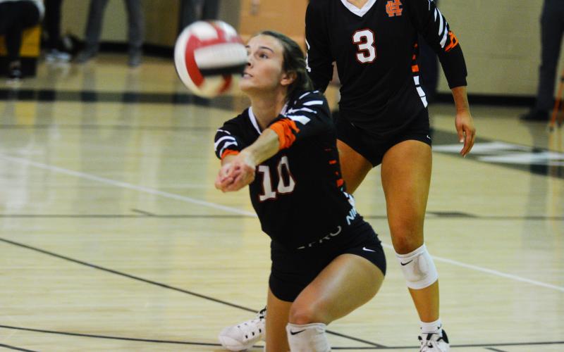 Ryleigh Jordan gets a dig in the match against Wesleyan on Oct. 18.