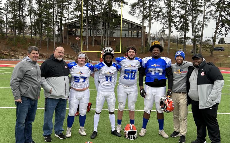 From left to right: Hart County head football coach Cory Dickerson, offensive coordinator Roger Gentry, offensive lineman Nick Carlson, defensive back Keith Curry, offensive lineman Logan Beard, defensive lineman Derrick Clarke, quarterbacks coach Caleb Sorrells, and defensive coach Don McCord at the FCA All-Star game on Dec. 17.