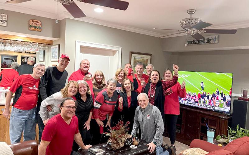 Most local Dawgs fans watched their team in the fashion seen above, from home. Pictured is the watch party hosted by the Trulove family.