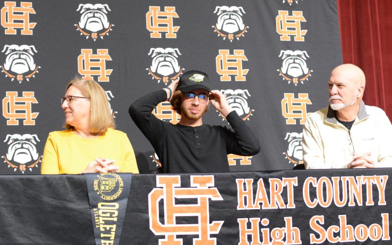 Pictured left to right: Leard’s mother, Karen, senior tennis player Daniel, and his father, Tim, as Daniel commits to Oglethorpe on National Signing Day.
