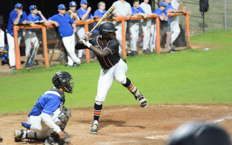 Senior outfielder Paul Davis collects a hit in the sixth inning three run rally but falls to Banks County, 6-4 on Tuesday.