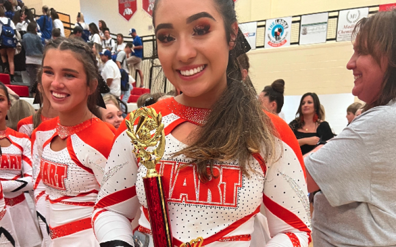 Senior competition cheerleader, Sofia Trujillo commits to Piedmont after receiving a scholarship to compete on the Lions competition cheer squad.