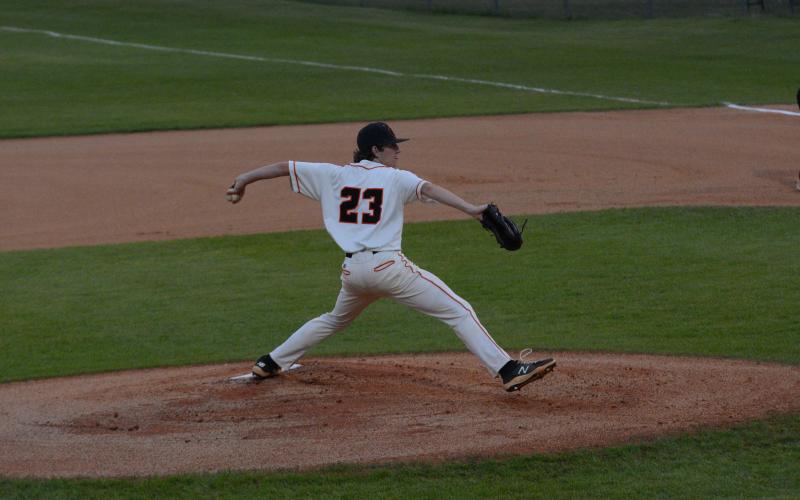 Junior pitcher Will Pittman winds up to deliver a pitch in the 7-6 home win over Washington-Wilkes on April 13. Pittman pitched four innings while only allowing two earned runs off of five hits.