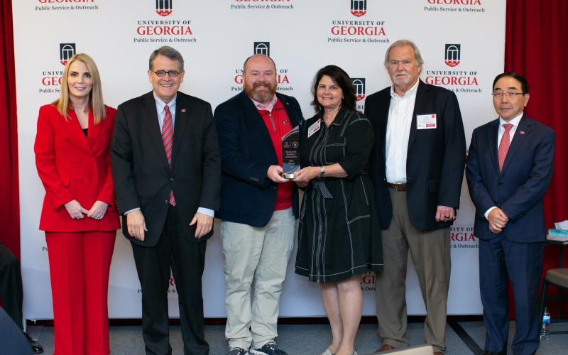 Hart Archway executive committee members Bill Leard and Jason Ford accepted the platinum designation for Hart County becoming a Connected Resilient Community during UGA’s awards week. Pictured from left to right are Jennifer Frum, UGA Vice President for Public Service and Outreach; Jere Morehead, UGA President; Jason Ford, Hartwell Economic and Community Development Director; Michelle Elliott, Archway Partnership Director; Bill Leard, Hart County Archway Partnership Executive Committee Chairman; S. Jack Hu,