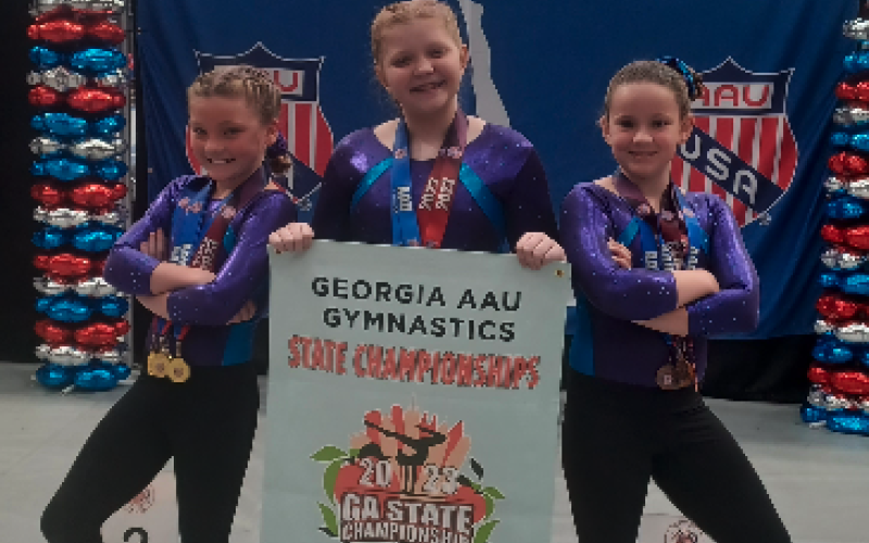 Picture from left to right is Gracen McAdams, Chastyn Haynie, Aeryn Back who are the AAU Level 4 state champions.