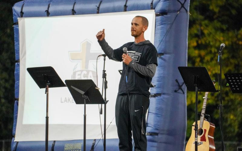 Pictured is Hart County High School quarterback coach Caleb Sorrells as he shares his testimony. 