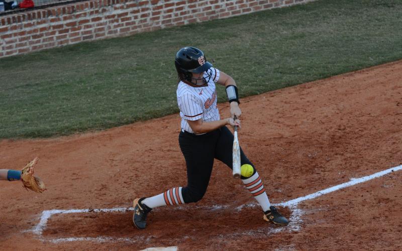 Senior infielder Gracie Cook drives in a run in the second inning in the 13-9 loss to the Lady Warriors of Oconee County.
