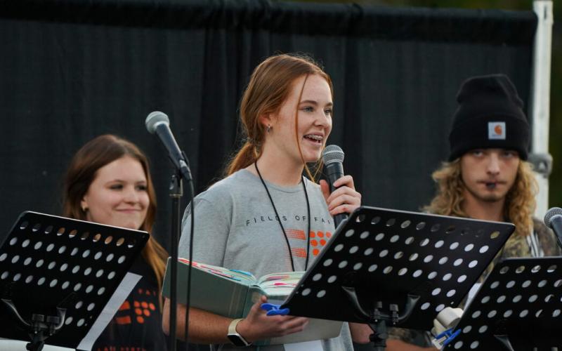 Pictured right is Juliette Cason speaking about what FCA stands for during the 2023 Fields of Faith event at Hart County Middle School’s Veteran Stadium on Oct. 25.