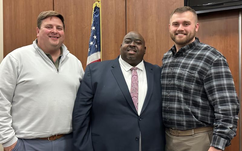 Hartwell City Manager Jon Herschell (left) stands with newly sworn in council members Richard Sheller (center) and Zach Adams (right). Sheller and Adams won their seats in a runoff election Dec. 5. 