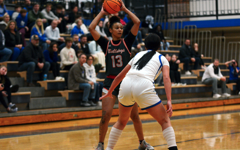 Senior forward Alexis Walker looks to pass the ball to an open teammate in the 44-31 road loss against Oconee County.