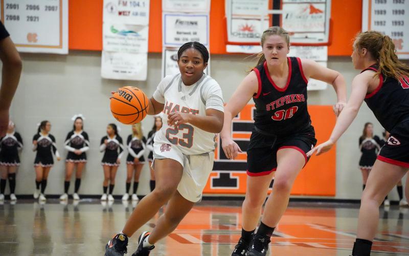 Junior guard TK Smith (23) drives into the lane as she was the co-leading scorer for the Lady Dogs with 17 points as Hart defeated the Lady Indians of Stephens County on Feb. 2, 55-43. 