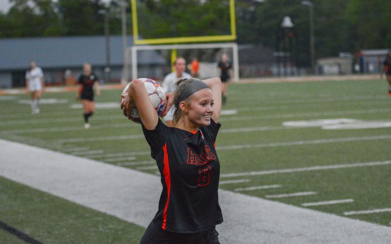 Pictured is sophomore midfielder Ryleigh Craft throwing the ball into play in the 4-1 loss to the No. 10 ranked Lady Lions of Hebron Christian on April 9 from Herndon Stadium.