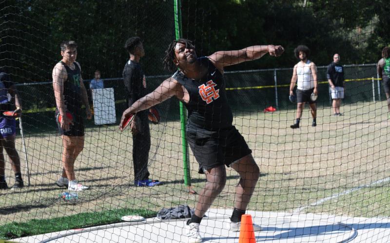 Pictured is senior discus thrower Trez Fouch as he captured a region championship in his respective event.